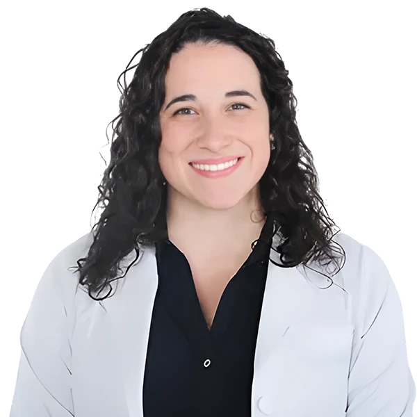 portrait of Laura Whitaker wearing a black shirt and white jacket.