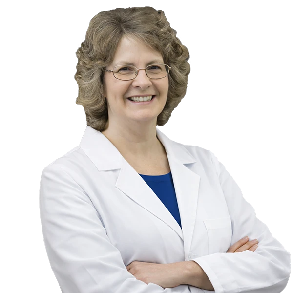 Portrait of Ruth Ann Fritz wearing a white lab coat and blue shirt.